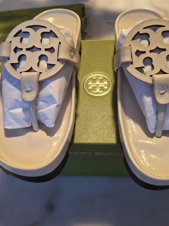 Tory Burch Shoes - Tory Burch Patent Leather Logo Thong Sandals in Ivory